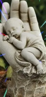 Stone sculpture of a baby cradled in a hand against a green background.