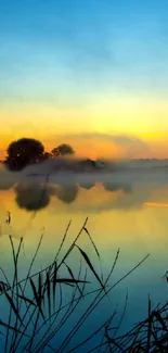Serene sunrise over a misty lake with calming reflections.