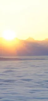 Serene sunrise over misty mountain peaks captured in mobile wallpaper.