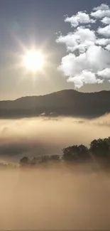 Serene sunrise with misty hills and fluffy clouds.