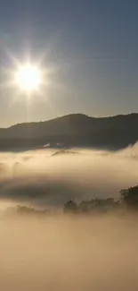 Sunrise over misty hills with soft golden hues.