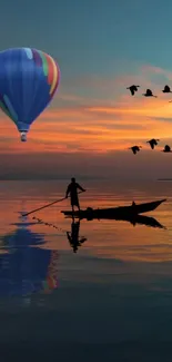 Sunset scene with hot air balloon, silhouette fisherman, and birds over water.