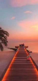 Tranquil sunset beach pathway with glowing lights.