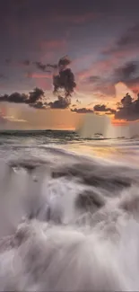 Sunset beach with dramatic waves and colorful sky wallpaper.