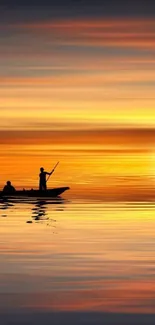 Tranquil boat silhouette under a vibrant sunset.