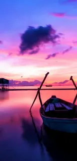 Serene sunset with solitary boat on purple lake.