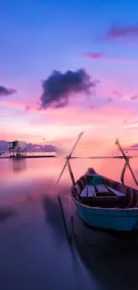 A tranquil boat on calm waters under a vibrant lavender sunset.