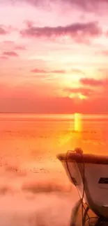 A tranquil sunset with a boat and pink sky.