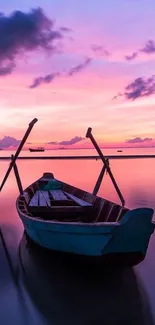 Peaceful boat at sunset with a purple sky reflecting on calm waters.