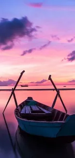 Serene boat at sunset on calm waters.