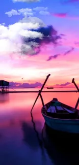 Serene sunset over ocean with boat reflecting in vibrant colors.