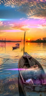 Tranquil sunset over a lake with a boat and colorful sky.