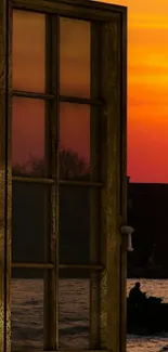 Sunset view through wooden window, serene atmosphere.