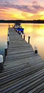 Wooden dock extending into tranquil lake at sunset.