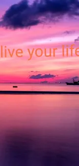 Inspiring pink and purple sunset wallpaper with 'live your life' quote.