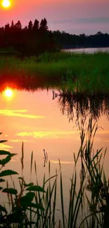 Serene sunset with vibrant colors reflecting on a tranquil lake.