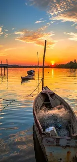 Serene sunset over a lake with a rustic boat, vibrant skies for mobile wallpaper.