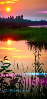 Serene sunset over a calm lake with orange and red reflections.