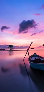 Calm boat on sunset lake with vibrant purple skies.