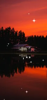 Orange sunset over lakehouse with serene reflections in water.