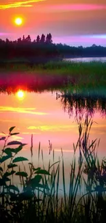 Serene sunset landscape with reflection over water.