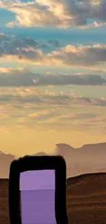 Serene mountain landscape at sunset under a vibrant sky.