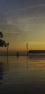 Serene sunset reflecting over calm waters with a silhouette in view.