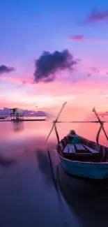 Serene sunset over calm waters with a lone boat in view, creating a peaceful scene.