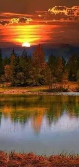 Serene sunset over a forest lake with vibrant reflections.