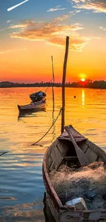 Serene sunset over a tranquil lake with vivid orange reflections.