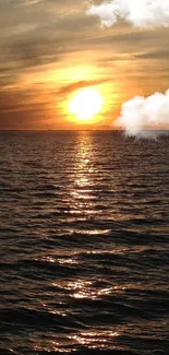 Serene sunset over ocean with dark waves and vibrant sky.