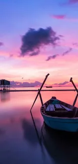 Serene boat on tranquil waters at sunset with a purple sky.