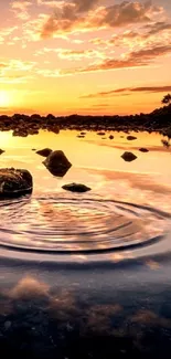 Serene sunset over water with vibrant sky and reflections.