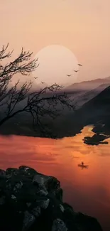 Tranquil sunset over a river with silhouetted trees and distant mountains.