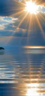 Sunset over water with reflections and clouds in the sky.