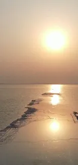 Sunset over a reflective water path creating a peaceful and serene atmosphere.