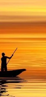 Paddler on a boat under a vibrant orange sunset.