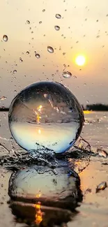 A glass sphere reflects a serene sunset with water droplets.