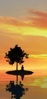 Silhouette of tree and person on an island at sunset with water reflection.