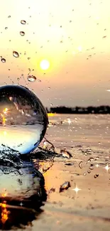 Glass sphere reflecting sunset with water droplets.