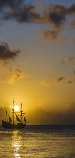 Ship sailing into a golden sunset with picturesque ocean view.