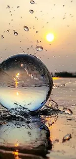 Sunset reflecting on a water globe with splashes and gentle sky hues.