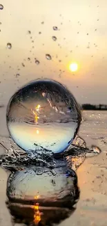 Sphere with water splashing at sunset with glowing orange hues.