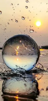 Crystal ball splashes water at sunset, creating reflections.