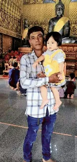 Family in a golden Thai temple interior with serene ambiance.