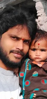 Father and child in front of a temple.