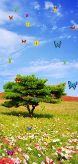 Solitary tree in a colorful field under a vibrant blue sky.