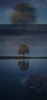 Serene tree reflecting on calm water under a peaceful navy blue sky.