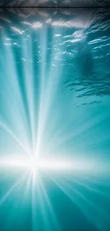 Tranquil underwater scene with radiant blue light rays.