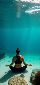 Serene underwater meditation in tranquil ocean setting.